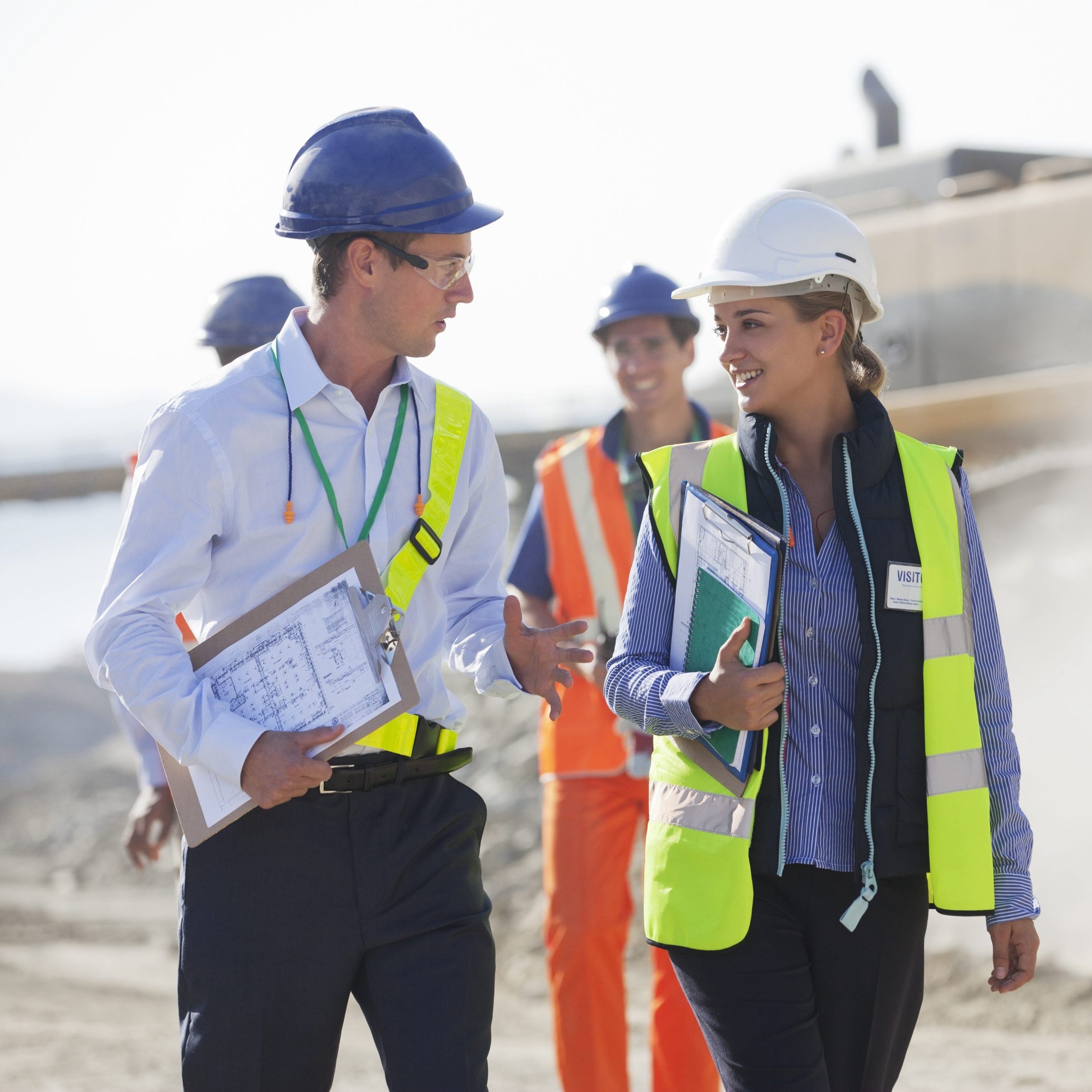 Business people talking in quarry